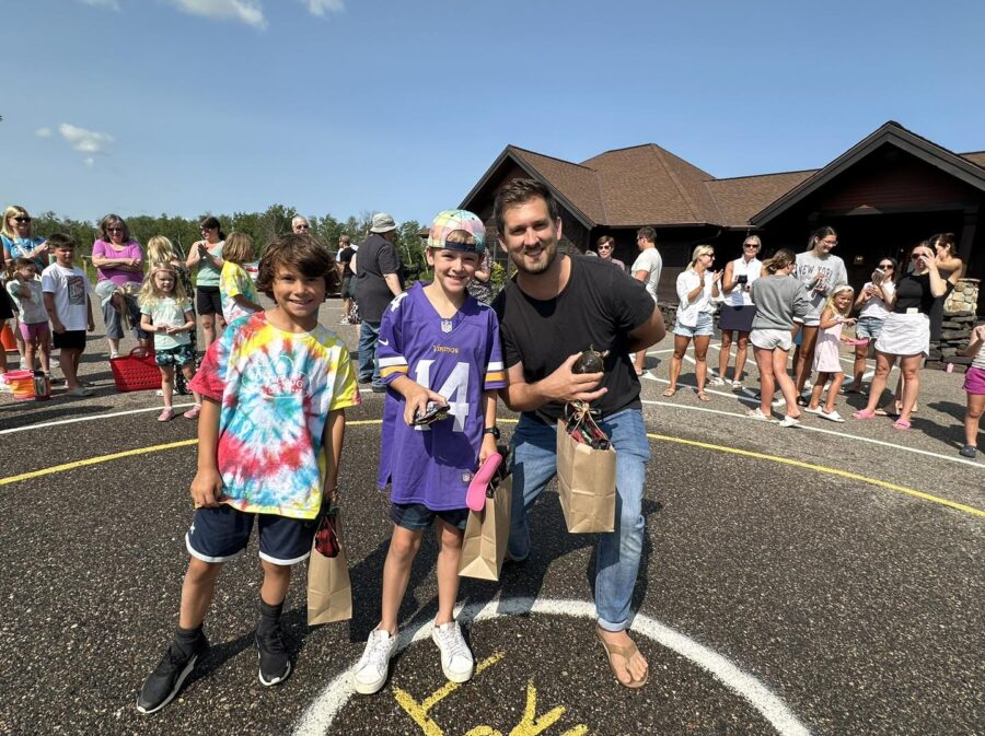 People gathered for a turtle race activity in the summer at Boyd Lodge resort